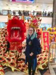 Majbrit and a figure of dragon during the Chinese New Year in a shopping mall in Hong Kong